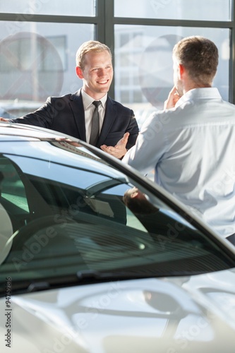 Car dealer showing auto