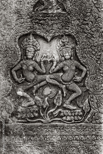 Apsara Dance. Bas-relief on the walls of the ancient Khmer temple of Angkor Thom. © Sergey Belov