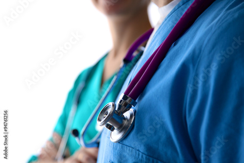 Close-up of unknown female doctor with stethoscope isolated