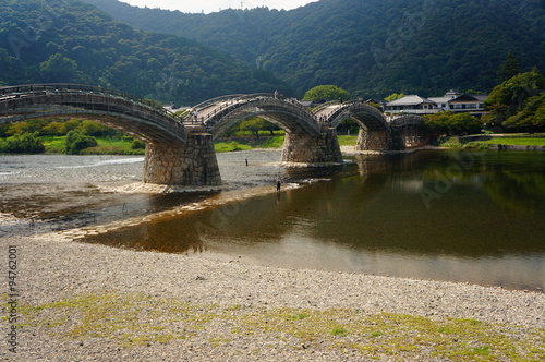 Kintai bridge (Kintaikyo) over Nishiki river in Iwakuni, Japan photo