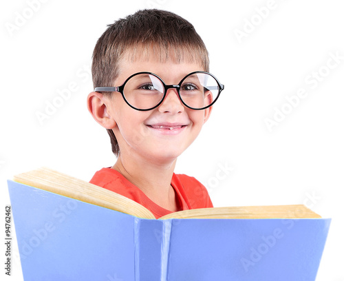 Little schoolboy with book ...