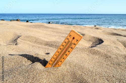 Thermometer on the Sand Beach photo