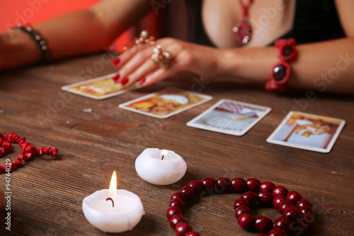 Witch - fortune teller reading fortune close up photo