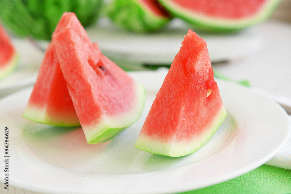 Sliced watermelon on plate closeup Sliced watermelon on plate closeup