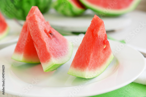 Sliced watermelon on plate closeup