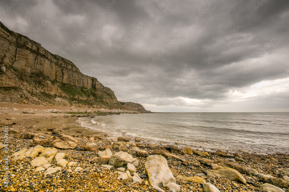 Rock-A-Nore cliffs under stormy sky on grey day