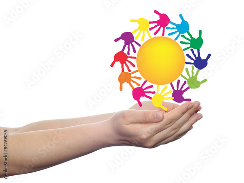 Concept circle of hands, yellow sun symbol