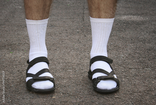 Men's feet in sandals