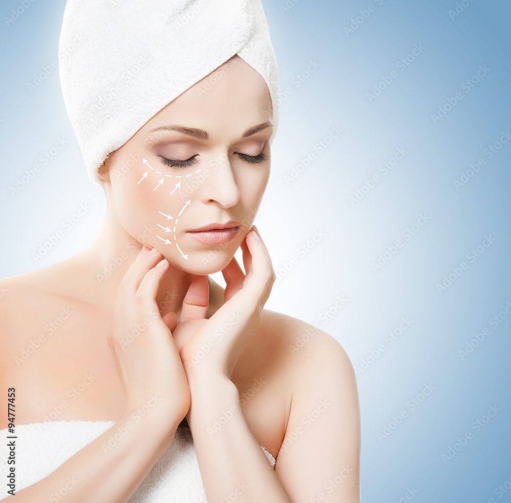 Attractive girl in towel isolated on white. Spa, wellness and he Attractive girl in towel isolated on white. Spa, wellness and he