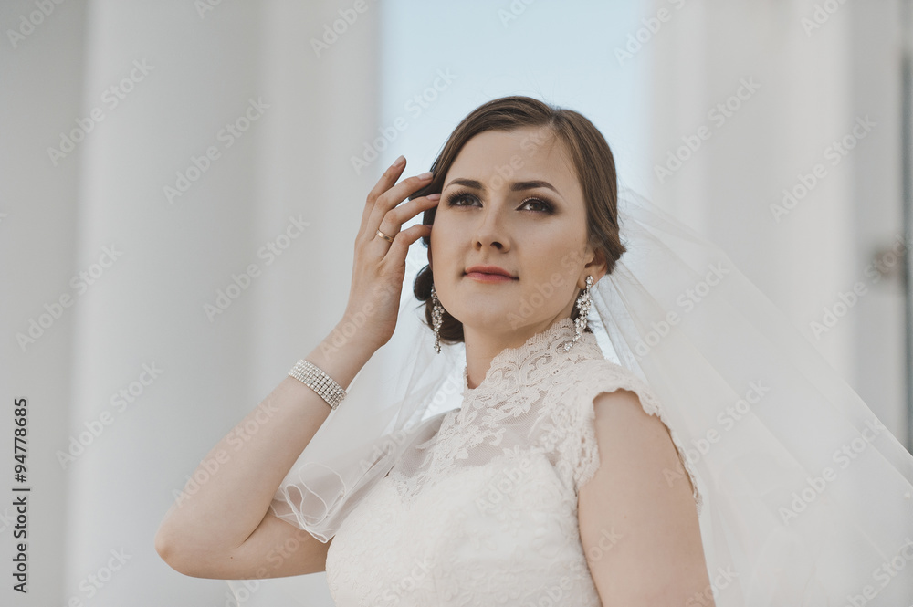 Portrait of a young bride about the white columns 4024. Portrait of a young bride about the white columns 4024.