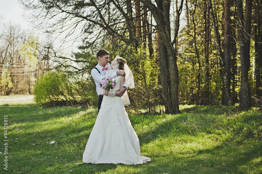 The groom embraces the brides shoulders 4072. The groom embraces the brides shoulders 4072.