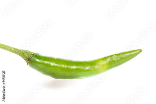 green chili peppers on  white background