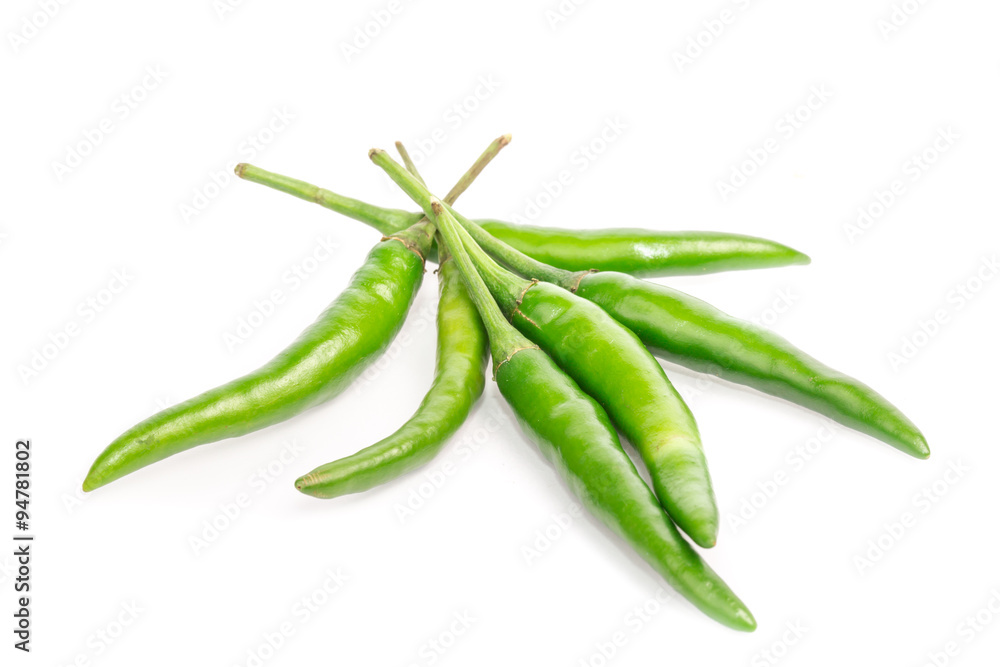 green chili peppers on white background green chili peppers on white background
