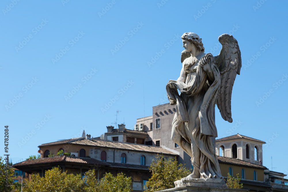 One of the angels at the famous Sant' Angelo bridge, Rome, Italy.