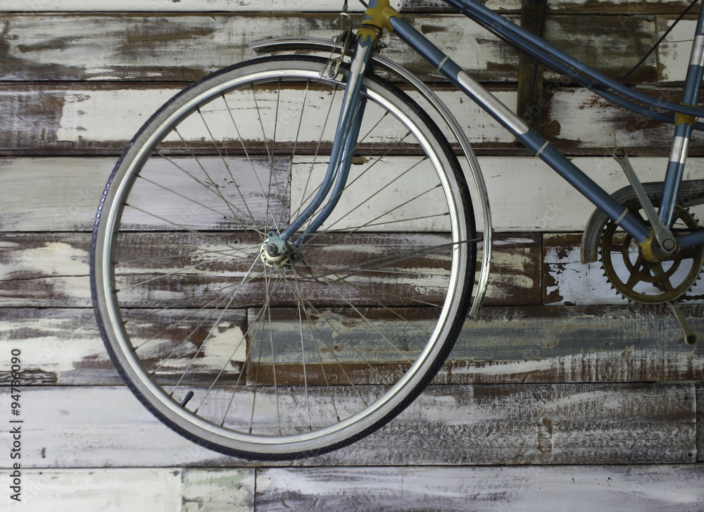 Antique old bicycle on the wall