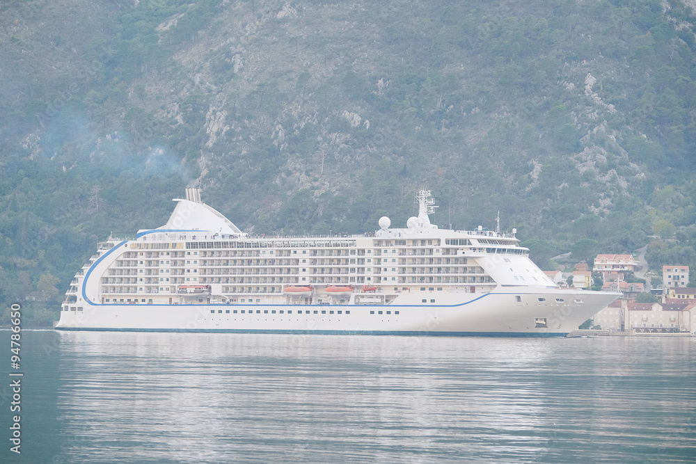 Landscape with the image of cruise liner in Kotor Bay, Montenegro
