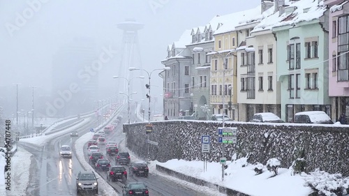 rush hour in Bratislava, capital of Slovakia in the winter, snowing