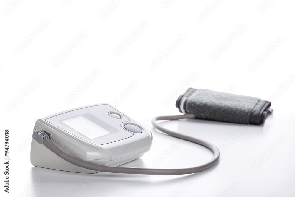 Digital Blood Pressure Monitor closeup on white Digital Blood Pressure Monitor closeup on white