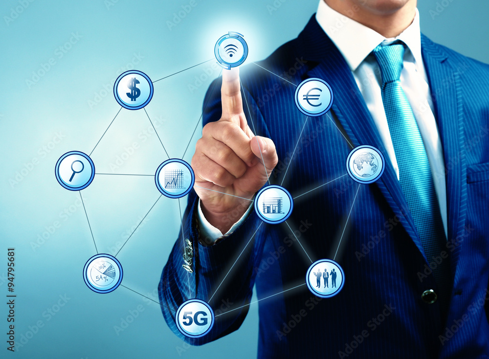 Business, technology and internet concept - businessman pressing button on virtual screen Business, technology and internet concept - businessman pressing button on virtual screen