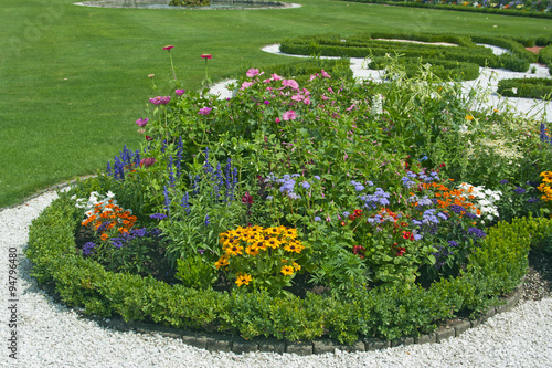 Bright flowers on the flowerbed photo