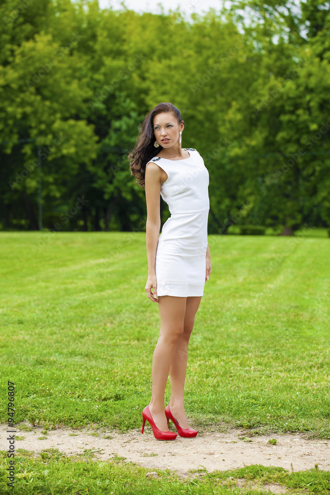 Happy young model in white sexy dress Happy young model in white sexy dress
