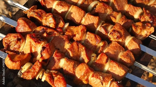 Barbecue with delicious grilled meat on grill.