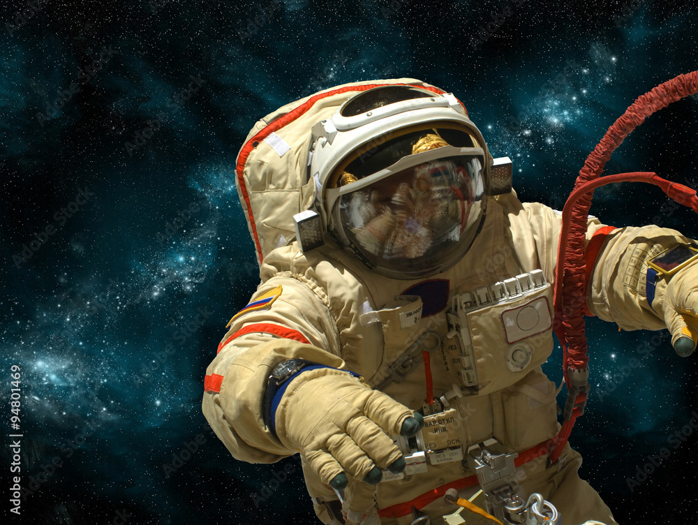 A cosmonaut floats in deep space - Elements of this image furnished by NASA.