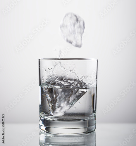 ice fallig in a glass photo