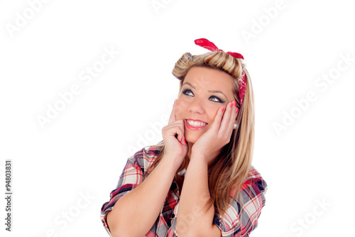 Pensive girl with pretty smile in pinup style