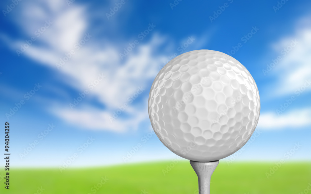Plain white golf ball sitting on a tee Plain white golf ball sitting on a tee