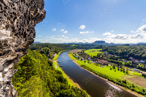 View from viewpoint of Bastei in Saxon Switzerland Germany to the town city and the river Elbe on a sunny day in autumn
