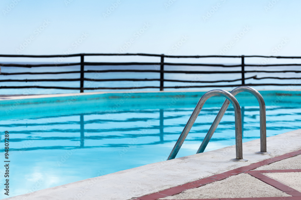 Grab bars ladder in swimming pool