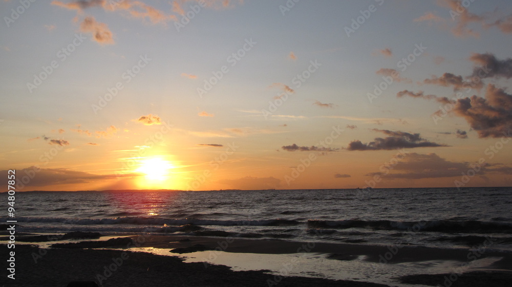 Zachód słońca nad morzem - obrazy, fototapety, plakaty 