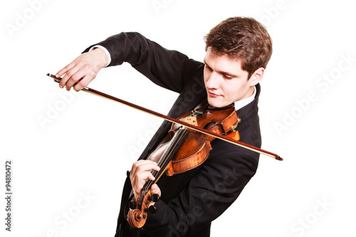 Photography Man violinist playing violin. Classical music art