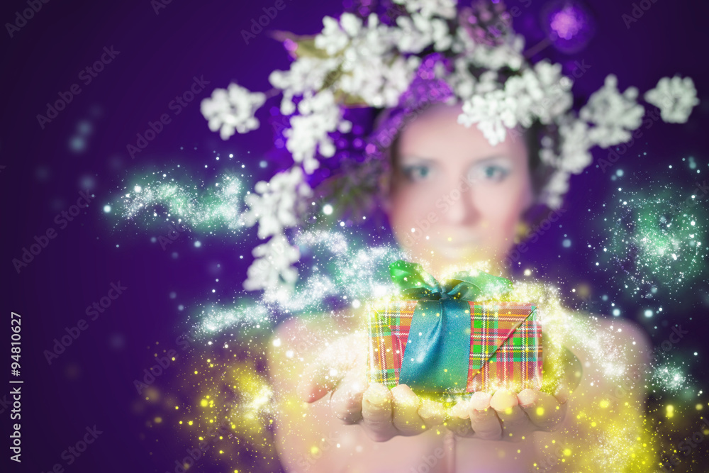 Fototapeta premium Christmas shopping winter magic woman holding gift, hairstyle and makeup