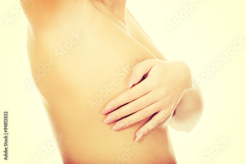 Wallpaper Mural Woman examining breast. Torontodigital.ca