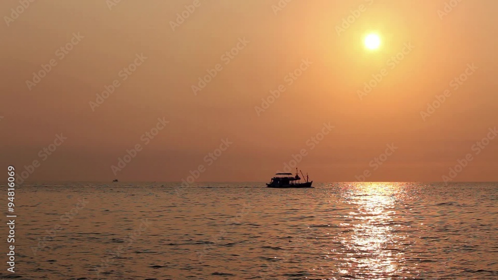 Tourist boat backlit sailing at sea, gulf of Thailand; hd 1080 static frame; Tourist boat backlit sailing at sea, gulf of Thailand; hd 1080 static frame;