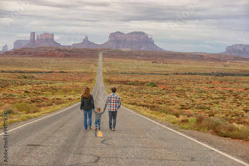 Family travel to Monument Valley and holding hands