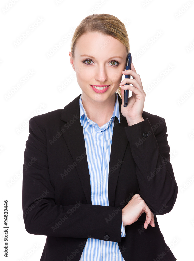 Caucasian businesswoman talk to mobile phone Caucasian businesswoman talk to mobile phone