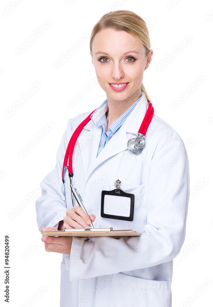 Female Doctor write on clipboard Female Doctor write on clipboard
