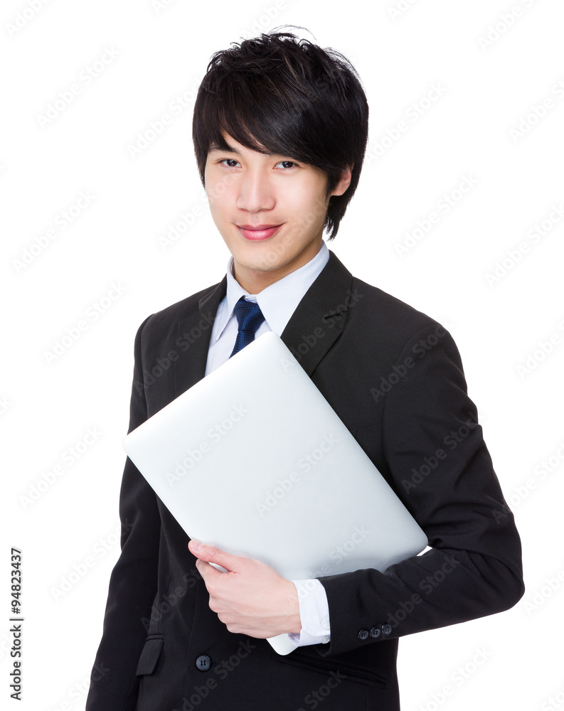 Asian Young Businessman hold with laptop computer Asian Young Businessman hold with laptop computer