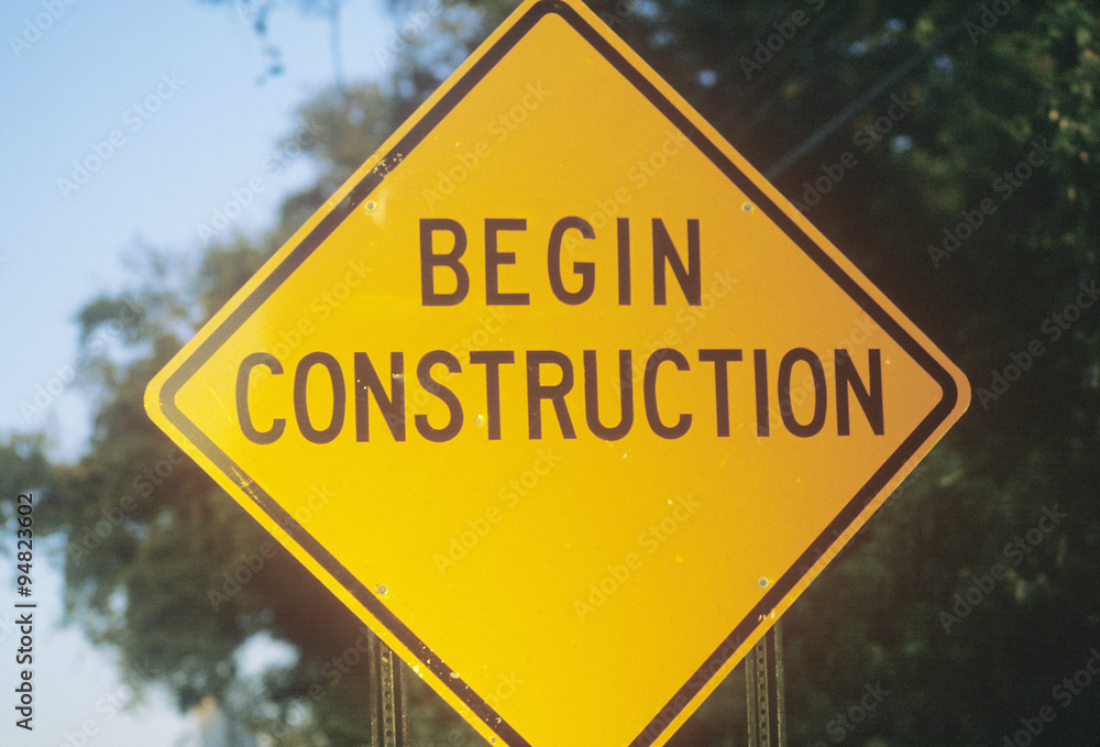 A sign that reads ÒBegin ConstructionÓ