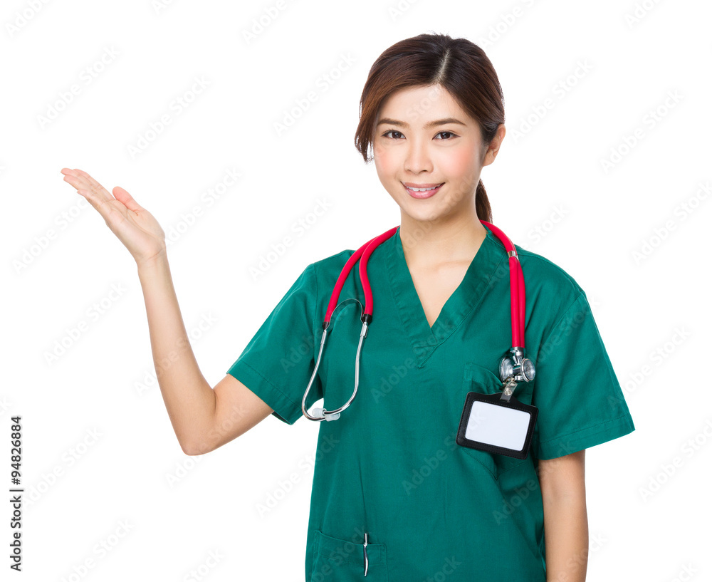 Young Doctor with hand showing blank sign Young Doctor with hand showing blank sign
