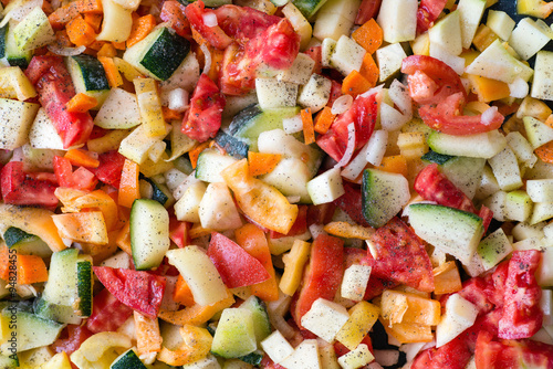 Slices of green, yellow and redvegetables