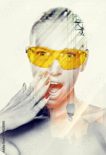Fototapeta Naklejka Na Ścianę i Meble -  Woman in yellow glasses
