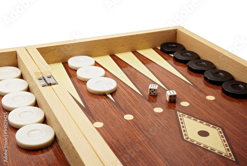 Backgammon Board Game with Black and White Pieces and Dice photo