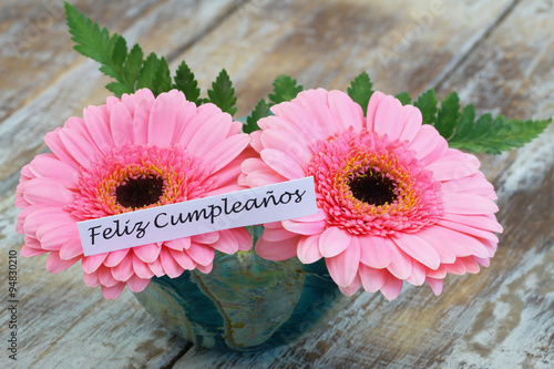 Feliz cumpleanos (Happy birthday in Spanish) card with pink gerbera daisies
