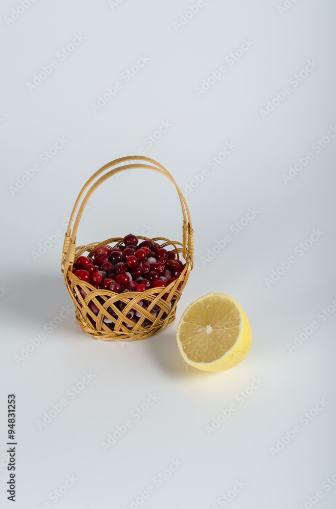 cranberry and lemon isolated on white background cranberry and lemon isolated on white background