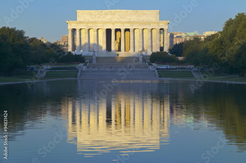 The Lincoln Memorial and Reflecting pond at sunrise in Washington D.C.