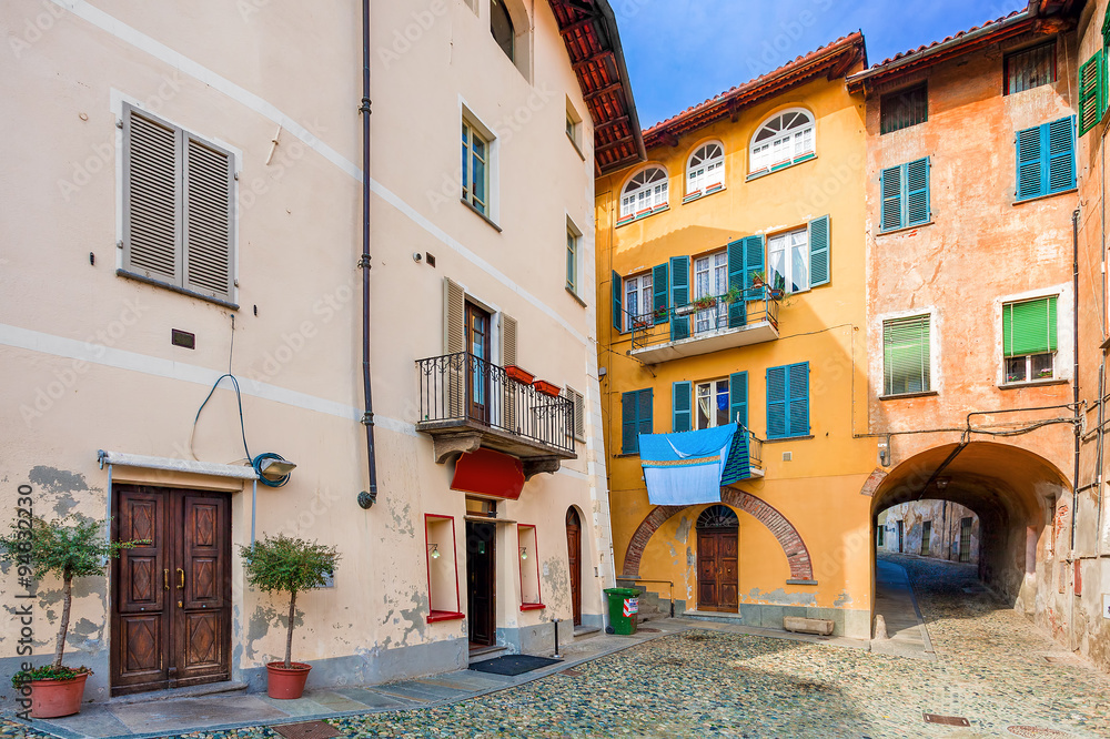 Small backstreet and colorful houses in Italy.